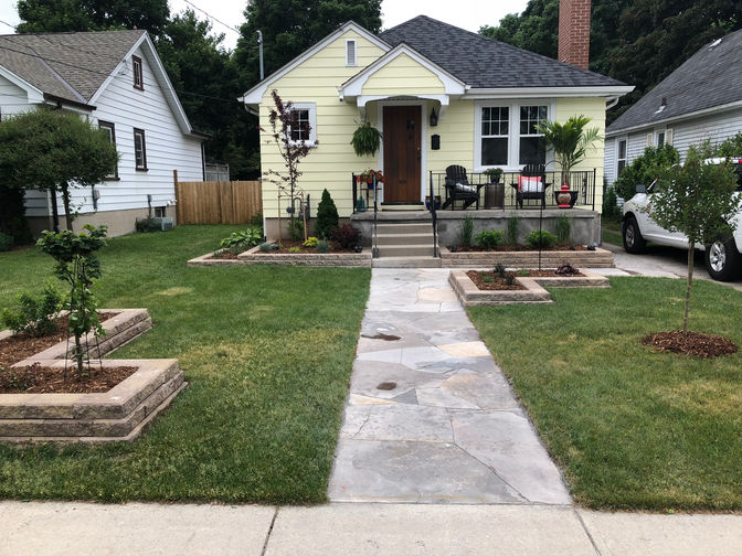 Custom landscape, retaining walls & walkway. A project by O'Connor Stone & Landscape