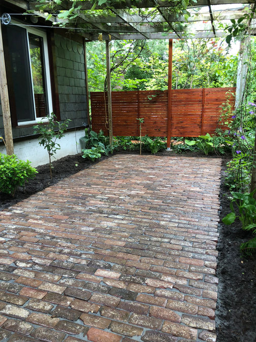 Reclaimed brick patio. A reclaimed brick patio project in London Ontario region by O'Connor Stone & Landscape.