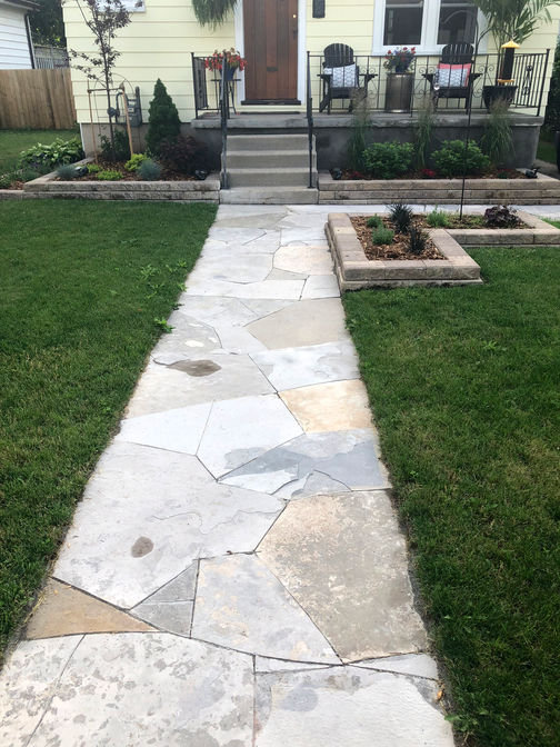 Custom cut random flagstone walkway. A stone walkway project in London Ontario region by O'Connor Stone & Landscape.