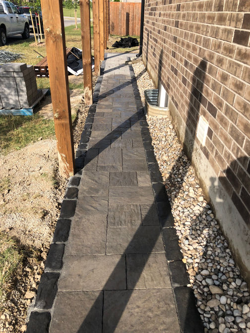 Interlocking paver walkway. A paver walkway project by O'Connor Stone & Landscape.