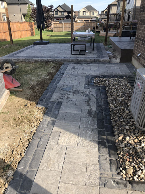 Paver patio and walkway, a project in London Ontario region by O'Connor Stone & Landscape.