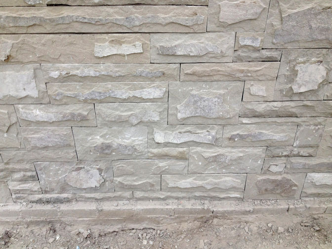 Natural stone wall cladding, a stone masonry or masonry project in London Ontario region by O'Connor Stone & Landscape, your landscape & hardscape contactor.