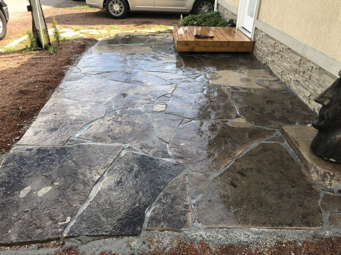 Random flagstone patio. A stone patio project in London Ontario region by O'Connor Stone & Landscape.
