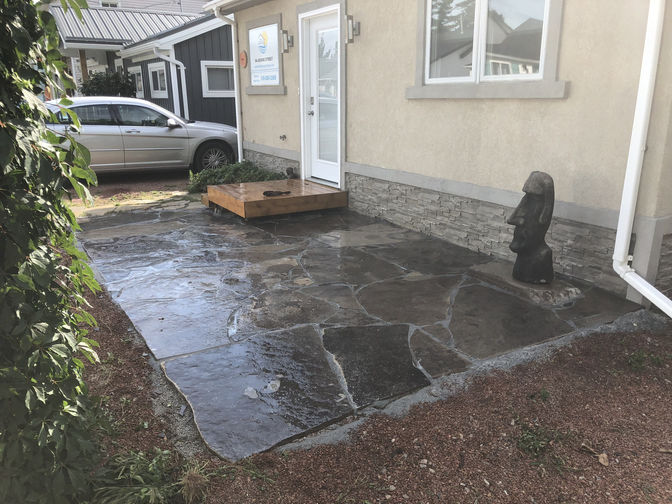 Natural flagstone patio. A stone patio project in London Ontario region by O'Connor Stone & Landscape