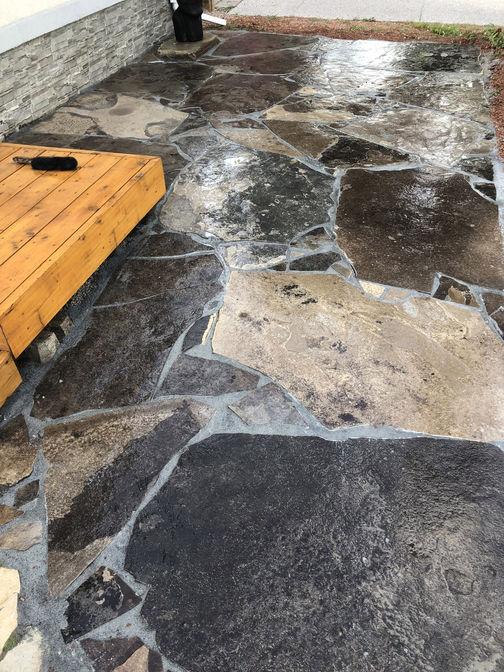 Random flagstone patio. A stone patio project by O'Connor Stone & Landscape.
