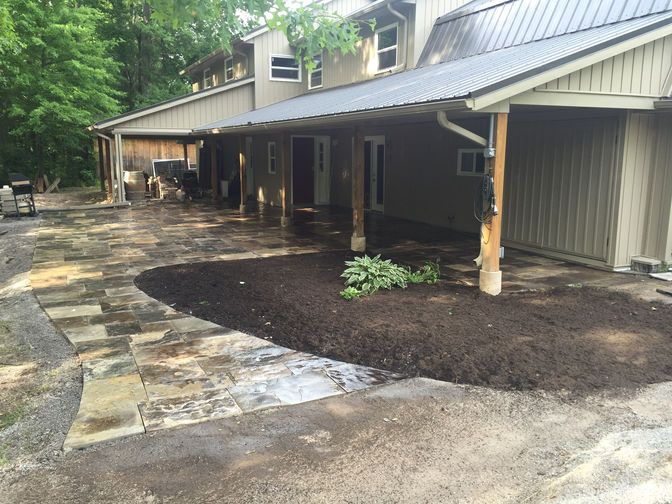 Square cut flagstone walkway and patio. A stone walkway project by the London Ontario based O'Connor Stone & Landscape.