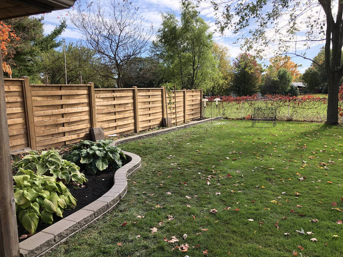 Engineered retaining wall. A retaining wall project by the London Ontario based O'Connor Stone & Landscape