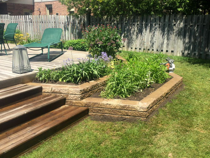 Engineered retaining wall. A retaining wall project by the London Ontario based O'Connor Stone & Landscape