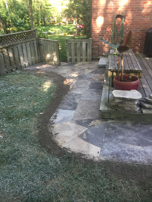 Custom cut random flagstone walkway. A stone walkway project in London Ontario region by O'Connor Stone & Landscape.