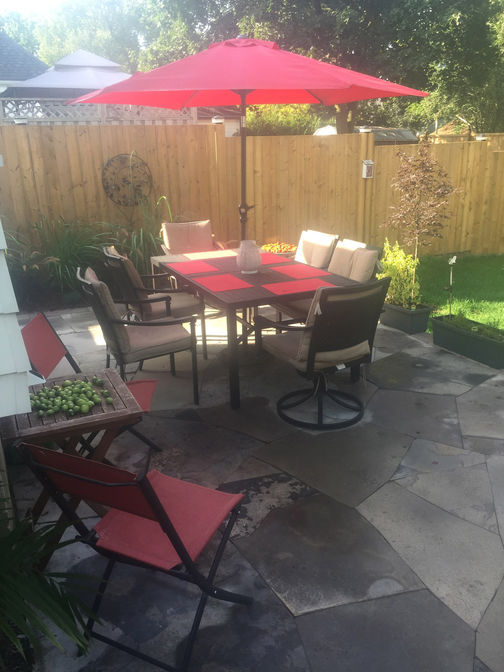 Custom cut random flagstone patio. A stone patio project by the London Ontario based O'Connor Stone & Landscape
