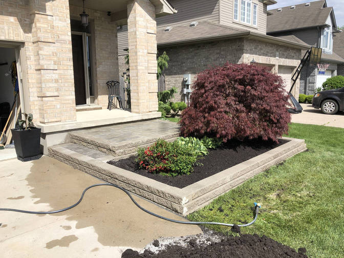 Retaining wall & landing. A project by the London Ontario based O'Connor Stone & Landscape