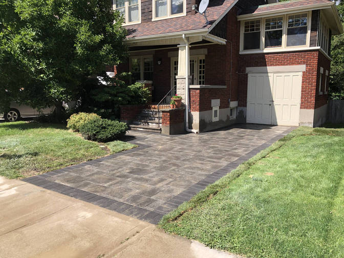 Interlock paver driveway. An interlocking paver driveway project in London Ontario region by O'Connor Stone & Landscape.