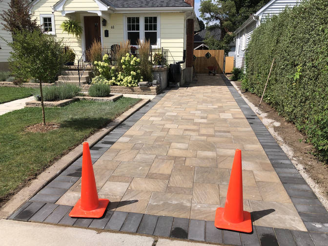 Interlock paver driveway. An interlocking paver driveway project in London Ontario region by O'Connor Stone & Landscape.
