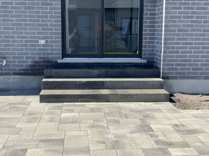 Paver patio and stone steps by O'Connor Stone & Landscape