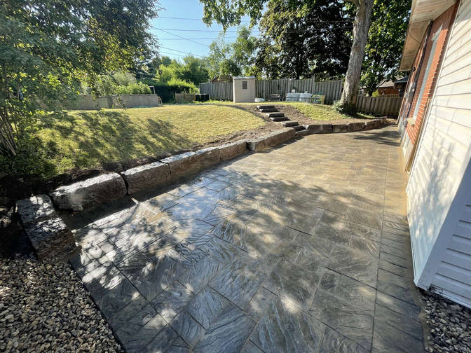 A paver patio project by the London based O'Connor Stone & Landscape