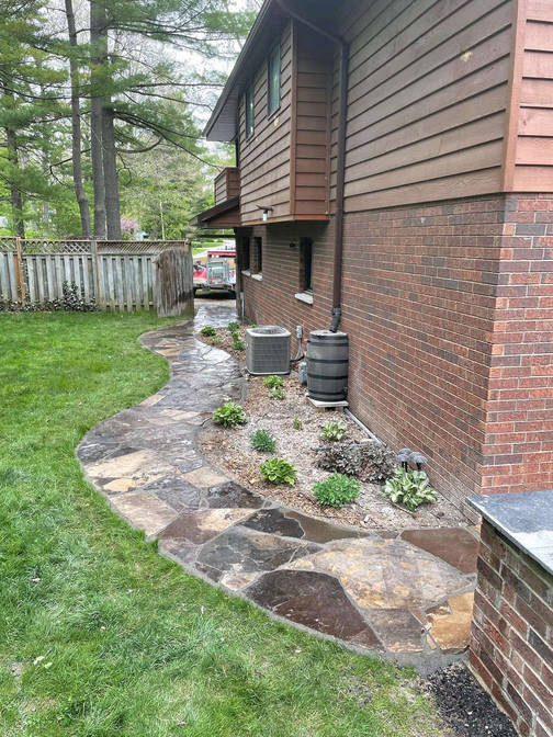 Random Flagstone Walkway A project by the London Ontario based O'Connor Stone & Landscape